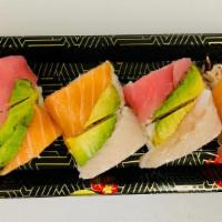 Rainbow Roll · California roll, topping tuna, salmon, white fish, and avocado.