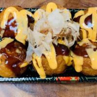 Takoyaki (6 Pcs) · Deep fried Japanese traditional breaded octopus balls