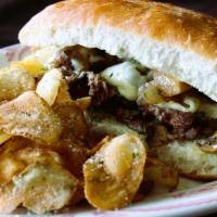 Philly Cheesesteak · Shaved ribeye, mushrooms, onions, white American, provolone, hoagie. Served with garlic parm...