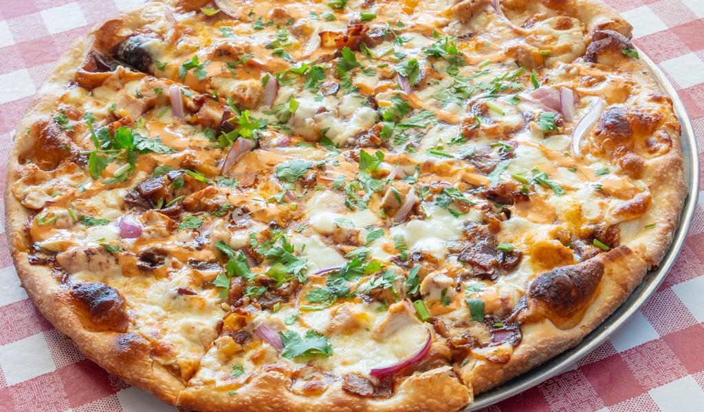 Barbeque Chicken Pizza · Mozzarella and cheddar cheese, BBQ sauce, chicken, bacon, red onion. Topped with cilantro and chipotle ranch.