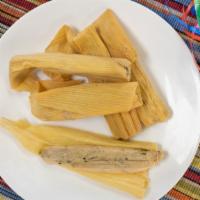 Tomatillo Chicken & Cheese · Our tomatillo chicken & cheese tamales offer a delightful combination of robust flavors. The...