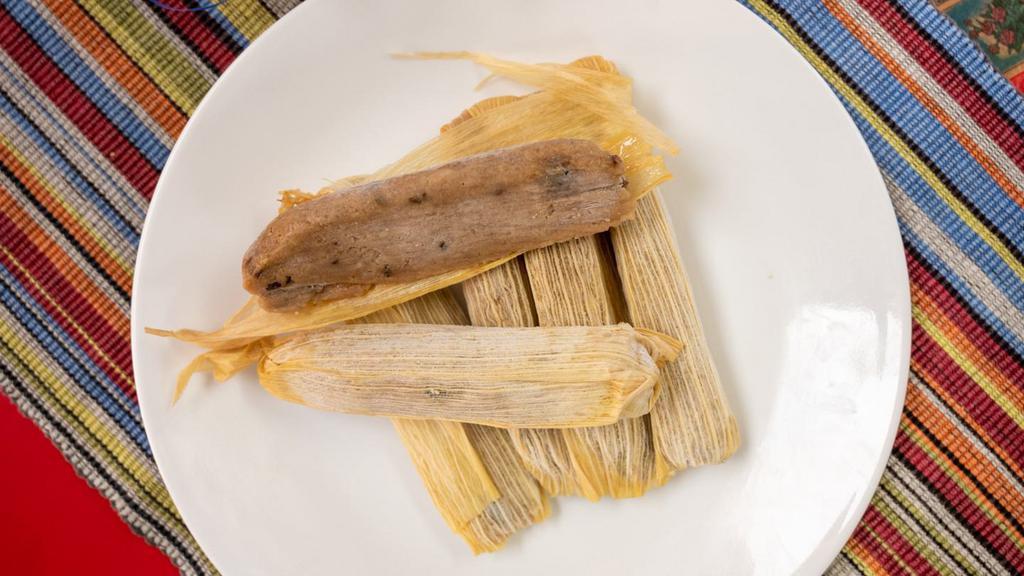 Sweet Tamale Dozen · The sweet tamales are made with coconut, raisins, and pecans. They are enjoyed especially for breakfast or dessert. The white and brown sugars used to make them combine to form a mouthwatering combination of sweetness. These sweet creations are too good to ignore.
