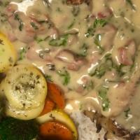 Lemon Pepper Chicken · PAN ROASTED CHICKEN BREAST TOPPED WITH A TOMATO HERB CREAM SAUCE. COMES WITH MIXED VEGETABLE...