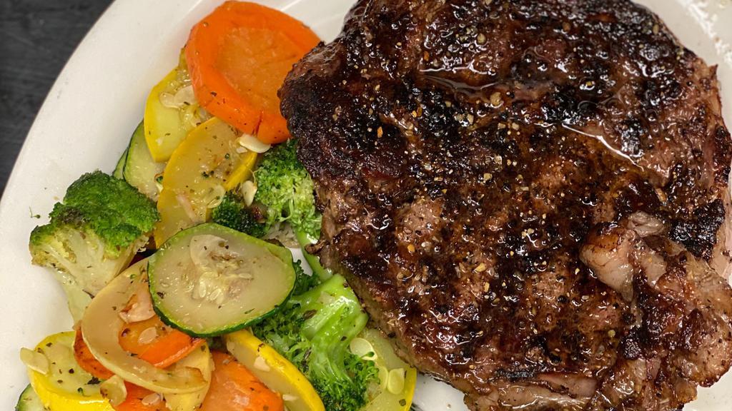 Ribeye · HAND CUT CHOICE RIBEYE. SERVED WITH MASHED POTATOES AND MIXED VEGETABLES.