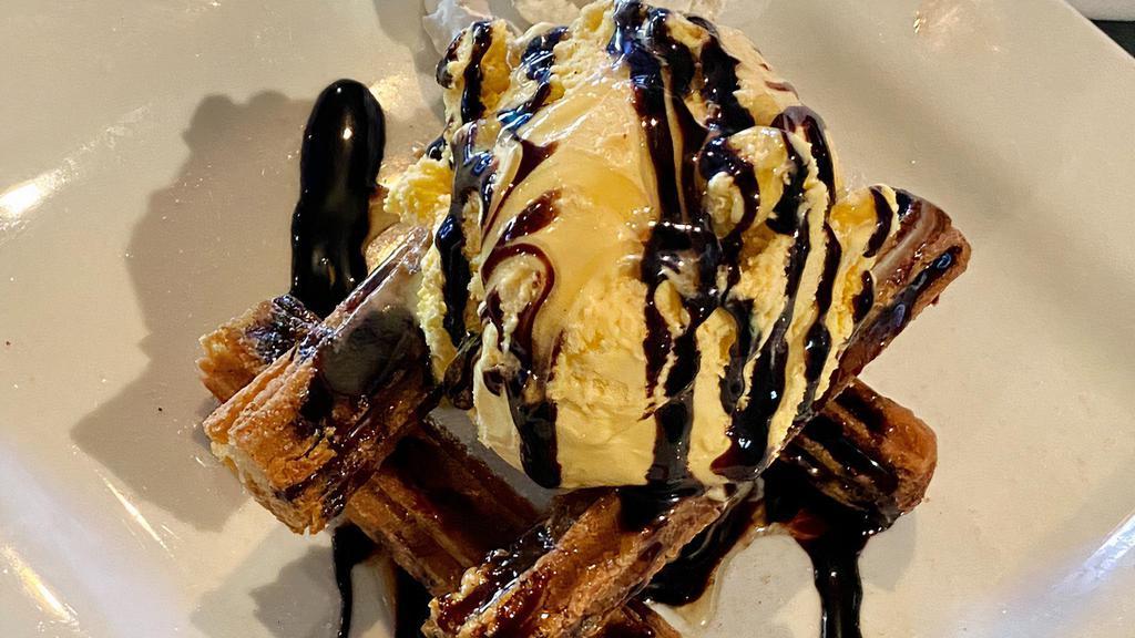 Churros · CINNAMON DUSTED CHURROS SERVED WITH FRENCH VANILLA ICE CREAM AND CHOCOLATE SAUCE. AMAZING!!!!