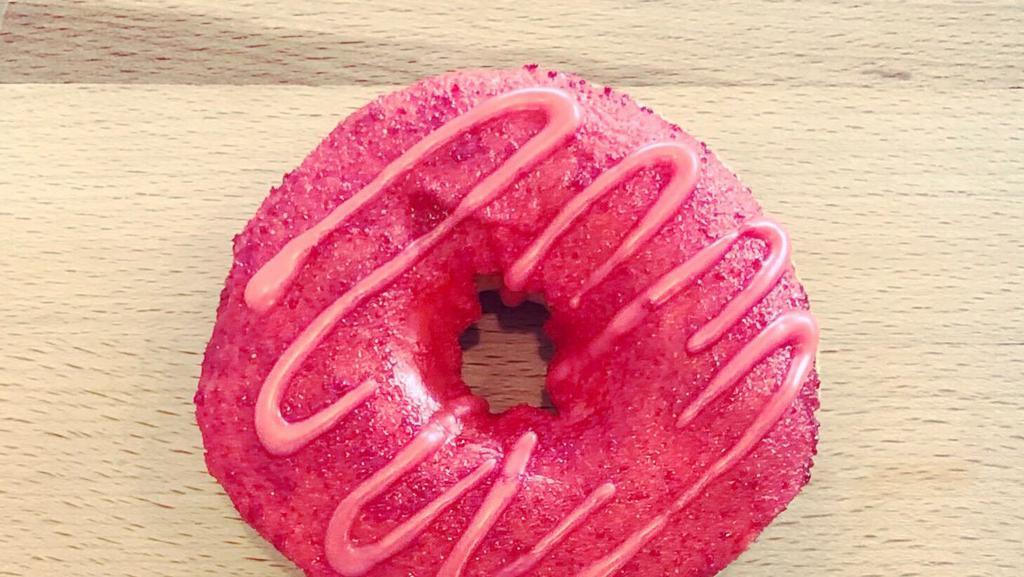 Cherry Delight · A perfect harmony of sour and sweet! Cherry candy iced with a bright maraschino cherry on top. Raised donut.