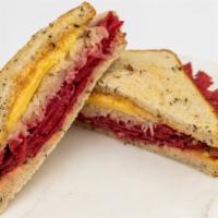 Vegan Reuben Sandwich · On toasted rye, with housemade marinated seitan, vegan smoked gouda, sauerkraut, and vegan 1...