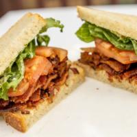 Blt · On toasted sourdough with lettuce, tomato, and mayonnaise and now with more local no-sugar P...