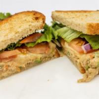 Tuna Melt · On toasted bakehouse sourdough, with housemade tuna salad, sharp cheddar, lettuce, tomatoes,...