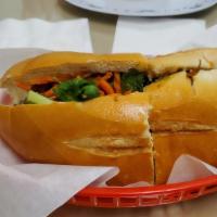 #14. Char-Grilled Pork Sandwich · Served with mayonnaise pickled carrot cucumber cilantro and jalapenos.