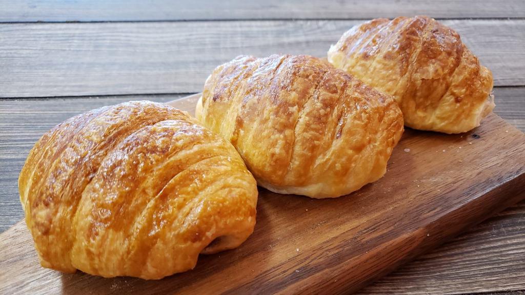 Croissant Sausage · Served on a flaky french pastry.
