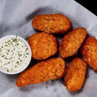 6 Pc Jalapeno Poppers · Jalapenos Filled with Cheese, Coated in Breading, Deep Fried