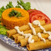 Flautas Plate · 3 flautas rice and beans, lettuce tomato and sour cream.