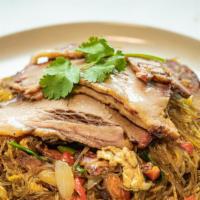 Brisket Pad Woon · Texas brisket, clear glass noodles stir-fried with, egg, sliced onion, green onion, bell pep...