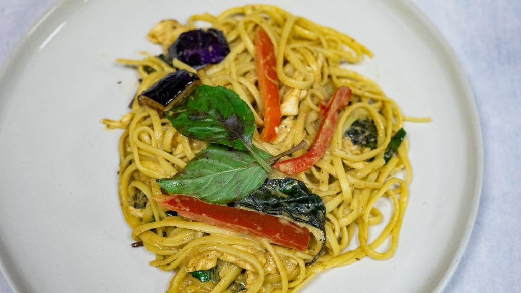 Thai Spaghetti Chicken Verde · House green curry paste with chicken stirred fry with linguini noodles, eggplant, bell pepper, bamboo shoot, and basil if you like sweet and spicy you will like this one.