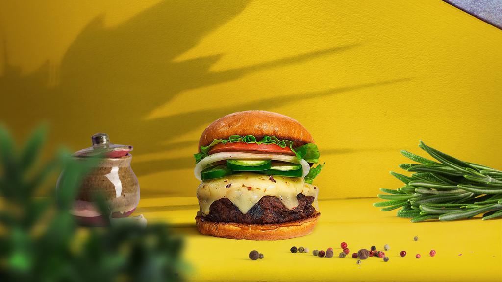 Give Me A Peno Burger  · Seasoned Beyond meat patty topped with melted vegan cheese, jalapenos, lettuce, tomato, onion, and pickles. Served on a bun.