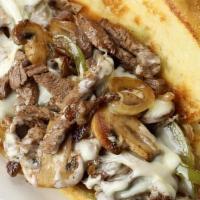 Philly Cheesesteak · Grilled steak, Grilled Onions, & Swiss American Cheese on White Roll 410-1250 Cal.
