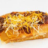 Angus Chili Cheese Dog · 700-830 cal. 1/4# Angus Hot dog served with Chili and cheese on a fresh baked bun. (Allergen...
