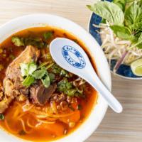 Beef Stew Noodle Soup · Prepared with rice noodles with slow-cooking tender beef and carrots.