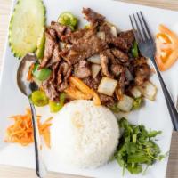 Sauteed Black Pepper Beef · Stir fried marinated tender beef with bell pepper, mushroom, white onion over steamed rice, ...