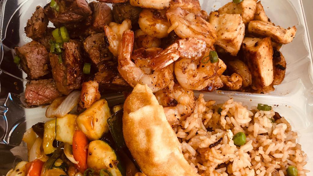 Three Meat Plate  · Steak, Shrimp, and  Chicken comes with mix vegetables and fried rice or steam rice