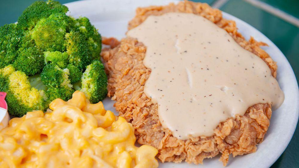 Chicken Fried Steak - Family Pack · This meal is served with four shiner bock battered chicken fried steaks, two family portion side orders and four iced teas.
