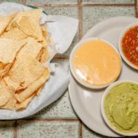 Triple Dipper · Guacamole, queso and salsa. Gluten free.