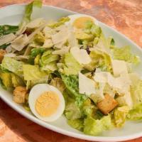 Caesar Salad · Whole romaine leaves, hard-boiled egg, kalamata olives, parmesan, garlic croutons, caesar dr...