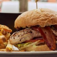 Grilled Chicken Sandwich · Grilled chicken breast, hardwood-smoked bacon, french fry aioli, shredded iceberg, vine-ripe...