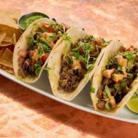 Impossible Tacos · Impossible meat, jalapeño salsa verde, avocado mash, chipotle aioli, pico de gallo, corn tor...