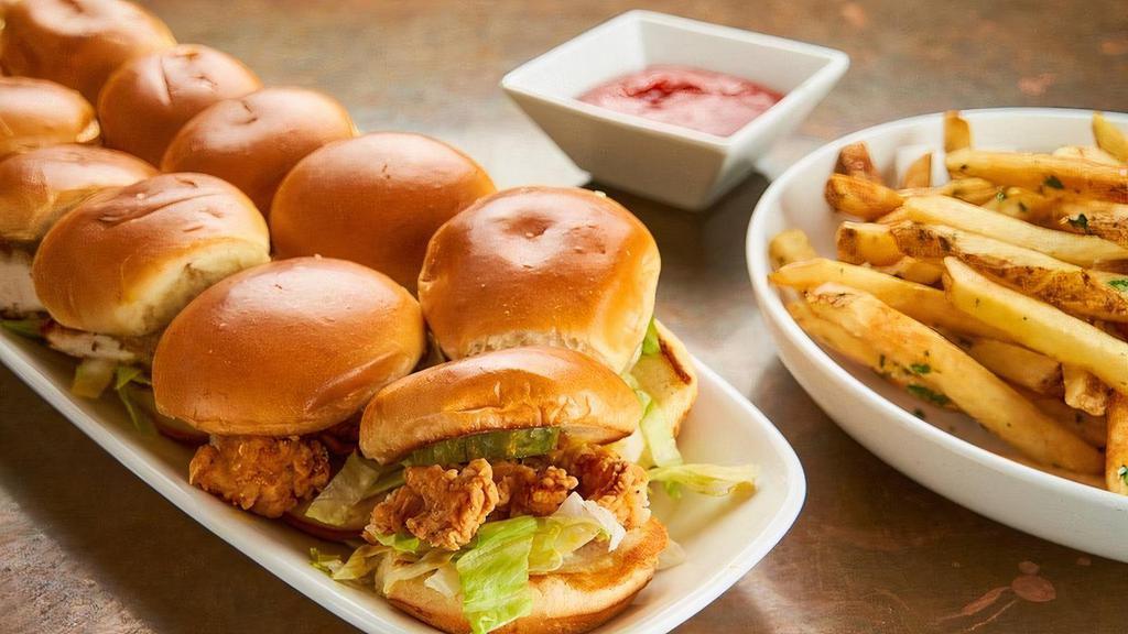 Mini Fried Chicken Sandwiches · Buttermilk breaded crispy chicken breast, spicy bread and butter pickles, Carolina mustard BBQ sauce, shredded iceberg, brioche bun.. 12 mini sandwiches.. Served with fries or side salad.. Carry out only. Serves 4-6.