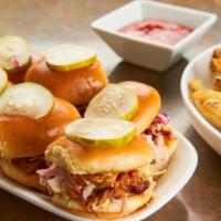 Mini Pulled Pork Sandwiches · Hand pulled Hardwood-smoked pork shoulder, bbq sauce, cider mustard, coleslaw, spicy bread a...