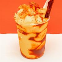 Mangonada Chica · Mangos blended with ice to make smoothie like with topping of mangos piece and chile and cha...
