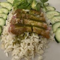 Ahi Tuna Bowl · Rice, edamame, cucumber, wasabi-sauce, seared tuna steak, crispy wontons.