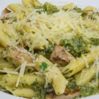 Penne Pasta With Spicy Pesto & Grilled Chicken · simmered in a delicious homemade flavory spicy basil pesto sauce, garnished with green onion...
