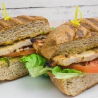 Marinated Grilled Chicken Breast · Marinated grilled chicken, lettuce, tomato and homemade honey mustard, served on a whole whe...