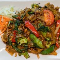 Pad Kee Mow · V / GF - Flat noodles, egg, white onions, tomato, bell peppers, basil, broccoli, jalapeños.