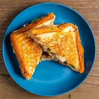 Street Grilled Cheese · Choice of meat, Texas toast, Oaxaca cheese, onions and cilantro.