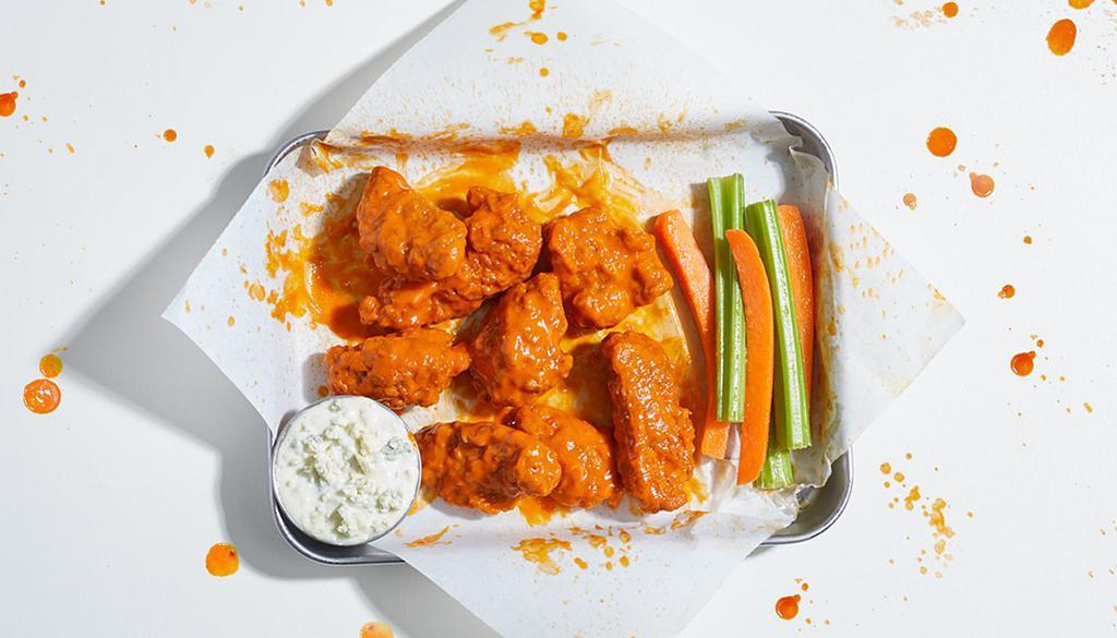 Boneless Chicken Wings (8) · 8 boneless wings with your choice of sauce. Served with blue cheese or ranch.