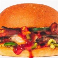 Bbq Bacon Burger · beef burger, white cheddar, bacon, fresh jalapeños, BBQ sauce & avocado spread