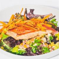 Salmon & Street Corn · seared salmon served with mixed greens, roasted corn, tomatoes, cotija, dressed with honey-l...