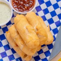 6 Tequeños Order · Six delicious freshly fried cheese sticks filled with amazing Venezuelan white cheese wrappe...