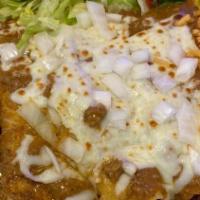 Cheese Enchiladas · 3 Cheese Enchiladas With Queso, Rice and Beans.
