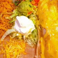 Super Burrito · Choice Of Pastor, Asada, Chicken, Lengua, Or Barbacoa With Rice, Beans, Cheese, Lettuce, Gua...