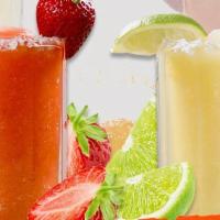 20 0Z Frozen Margarita · Choose from Lime, Strawberry, Lime+Strawberry Swirl, Mango