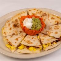 Breakfast Quesadilla · Our delicious Quesadilla made with Bacon and Egg and Cheese!  Big enough to share.  Make sur...