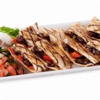 Fajita Chicken Quesadillas · Grilled Fajita Chicken, Sauteed Onions and Bell Peppers with Pepperjack Cheese