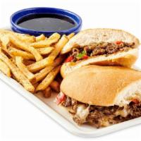 Philly Cheese Steak · Thinly sliced Steak grilled with Roasted Bell Peppers, Onions and Provolone Cheese. Served w...