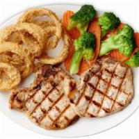 Grilled Pork Chops · Two Bone In Pork Chops, Seasoned and Grilled. Served with 2 Sides