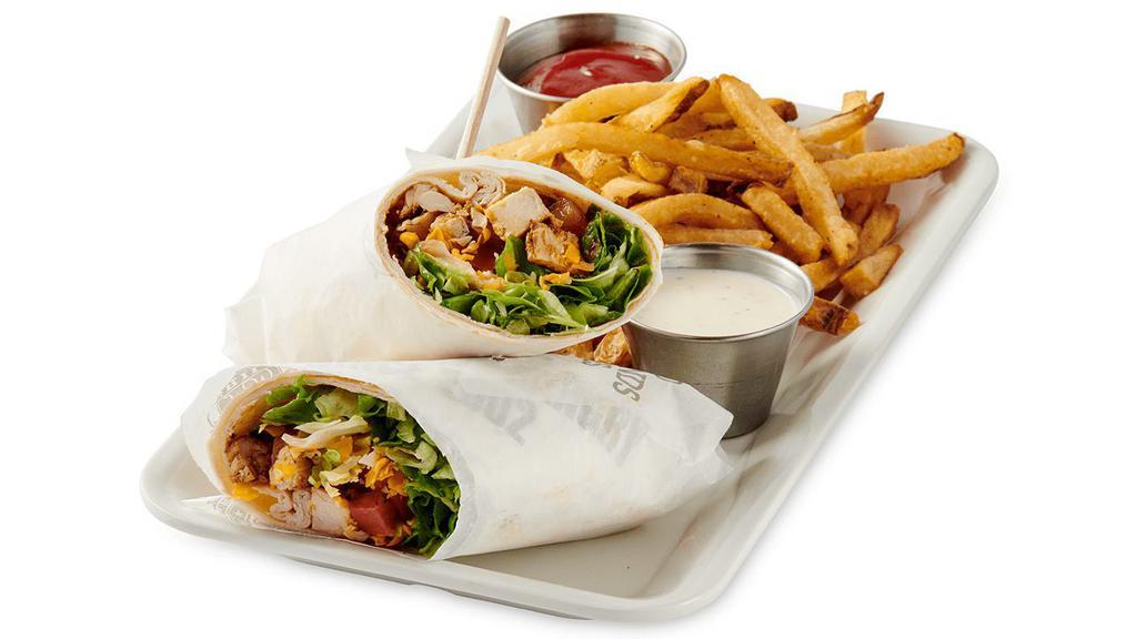 Grilled Chicken Wrap · Grilled Marinated Chicken, Shredded Lettuce, Roma Tomatoes and Mixed Jack/Cheddar Cheese in a Flour Tortilla
